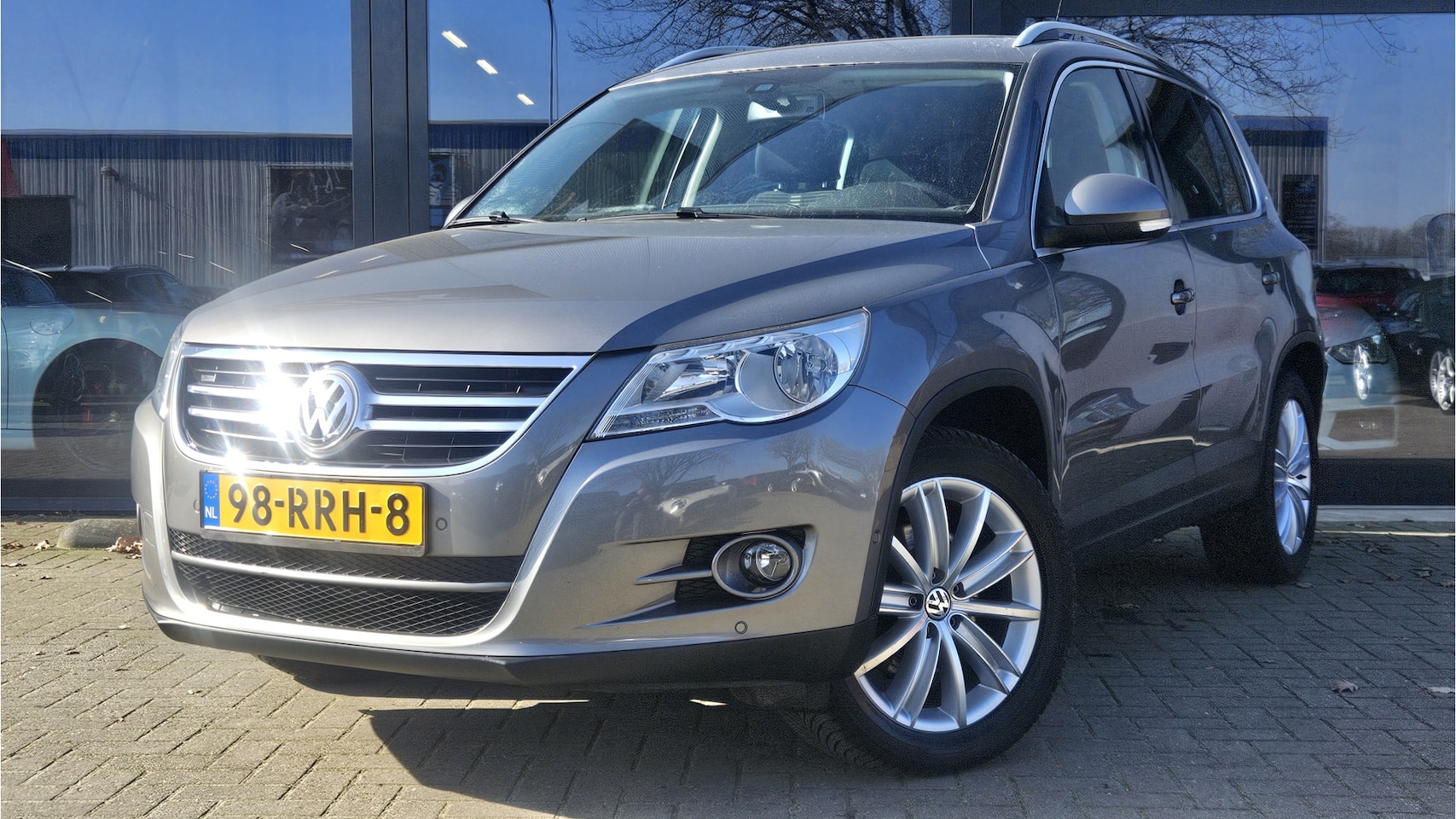 Volkswagen Tiguan - 1.4 TSI Sport&Style + NAVI + CRUISE + KLIMA + LM VELGEN - AutoWereld.nl