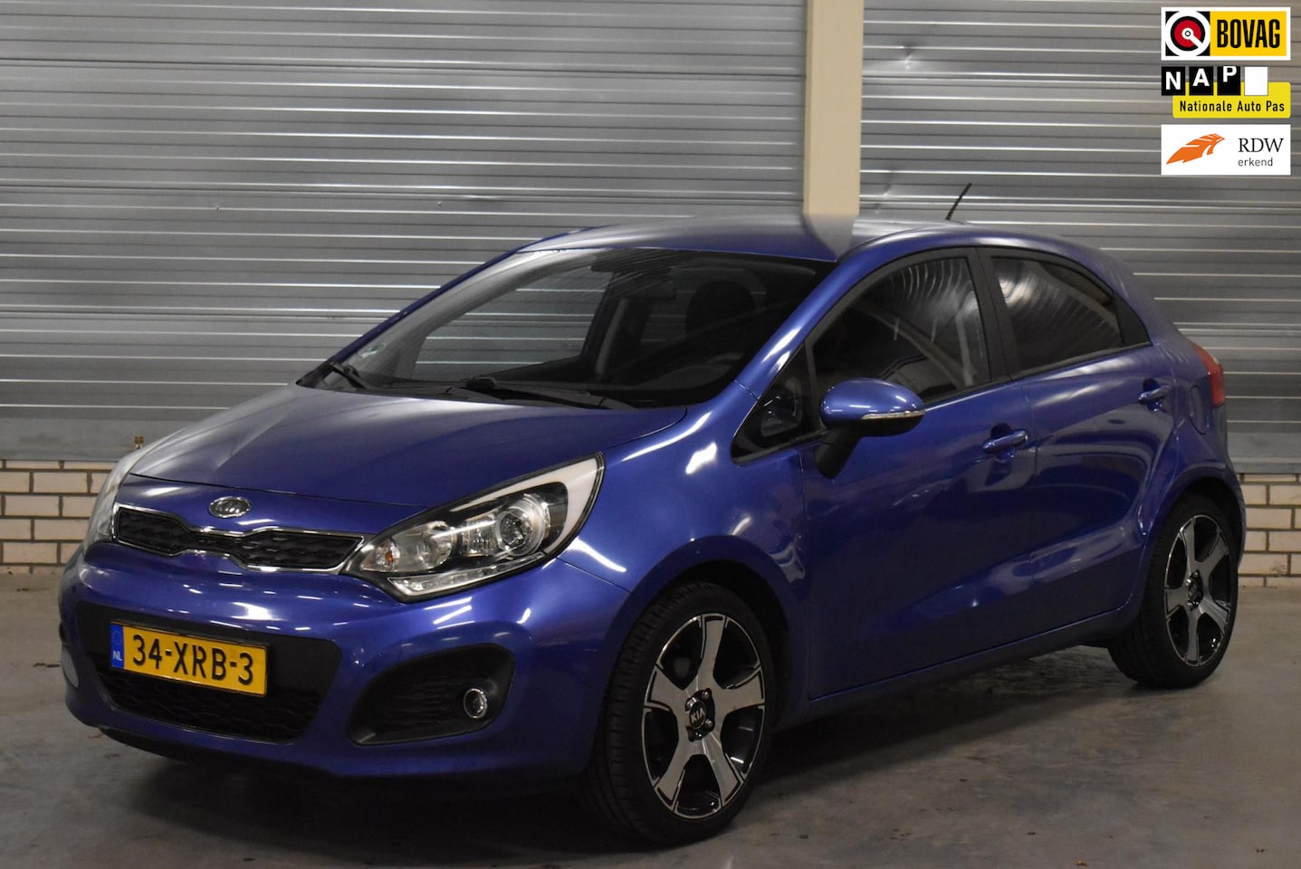 Kia Rio - 1.2 CVVT Plus Pack 111.000KM + Led|16 inch LM Velgen| Dealer Onderhouden|Cruise Control| - AutoWereld.nl