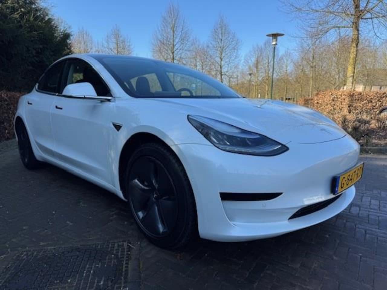 Tesla Model 3 - RANGE PLUS 60KWH 62000KM!! PANO/LEER/FABRIEKSGARANTIE - AutoWereld.nl