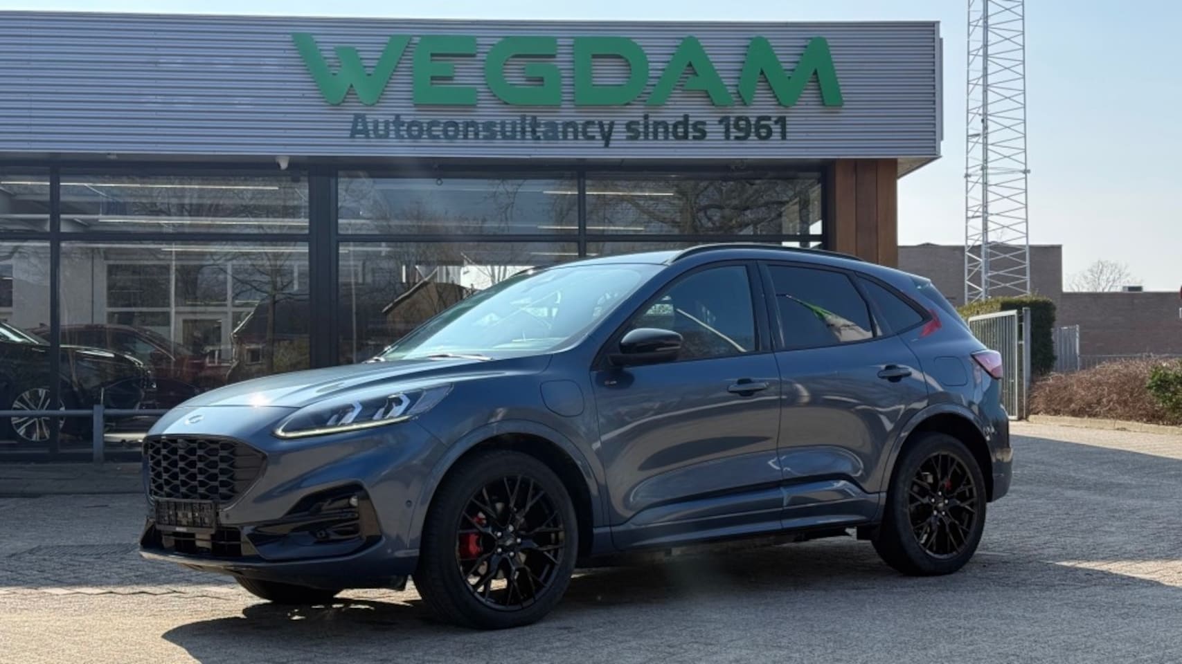 Ford Kuga - 2.5 PHEV ST-LINE X / BLACK PACK - AutoWereld.nl