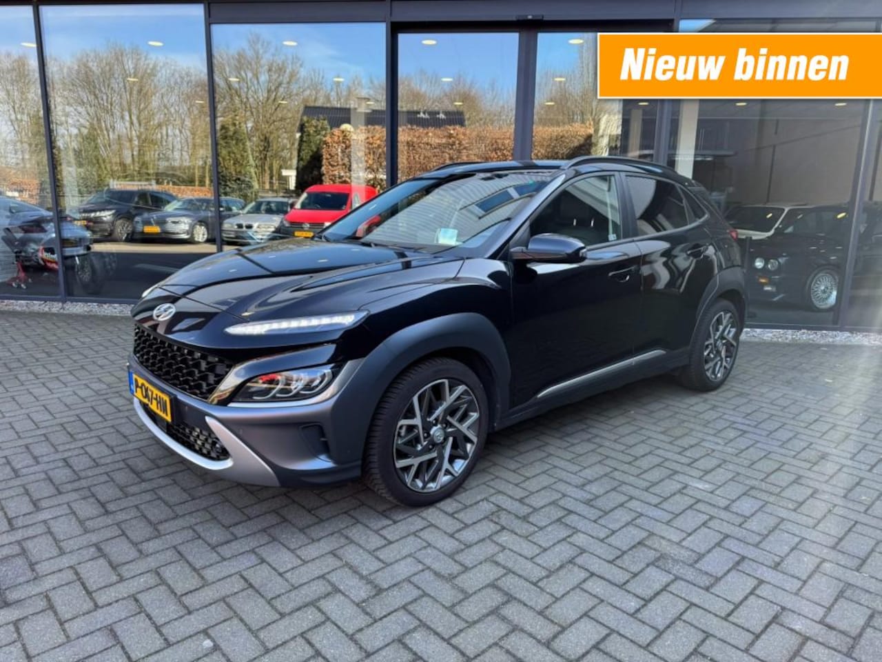 Hyundai Kona - 1.6 GDI HEV Premium 1.6 GDI HEV Premium,Leer,LED,Stoelverw+koeling,Keyless,NaviPro - AutoWereld.nl