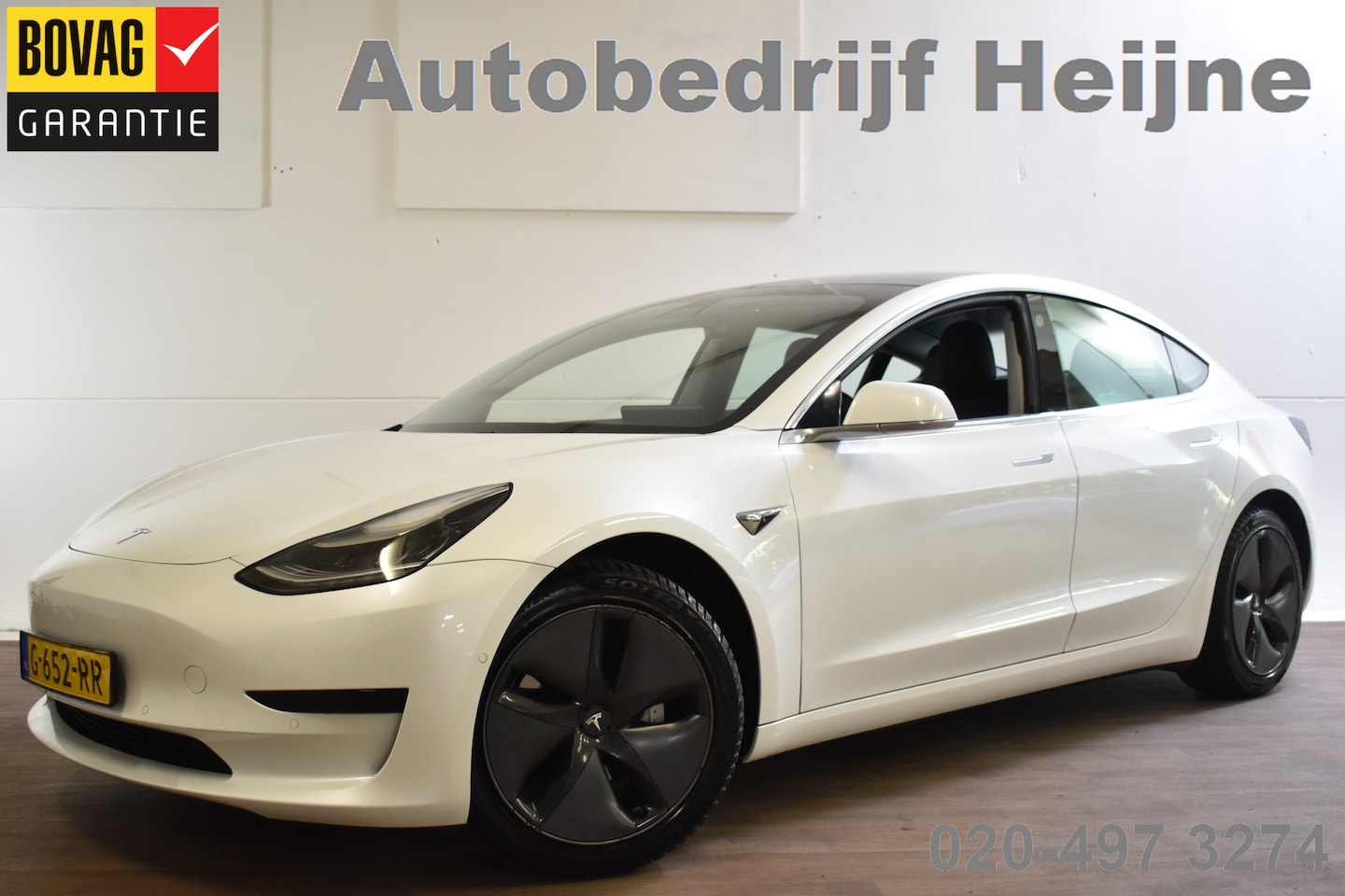 Tesla Model 3 - STANDARD RWD PLUS 60 kWh TREKHAAK/LEDER/AUTOPILOT - AutoWereld.nl