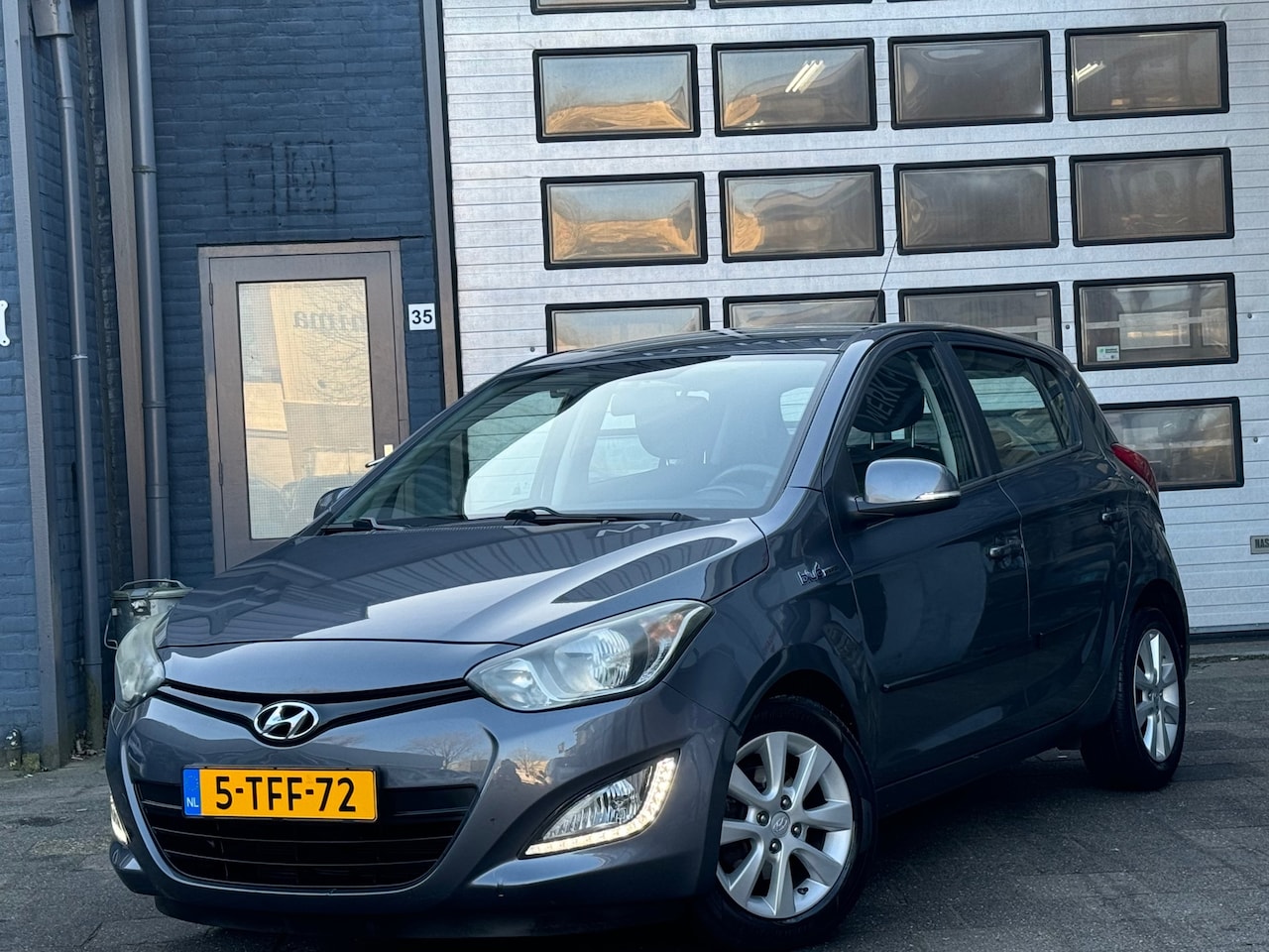 Hyundai i20 - 1.2i i-Deal | Airco | Navi | LMV | 41000 KM N.A.P - AutoWereld.nl