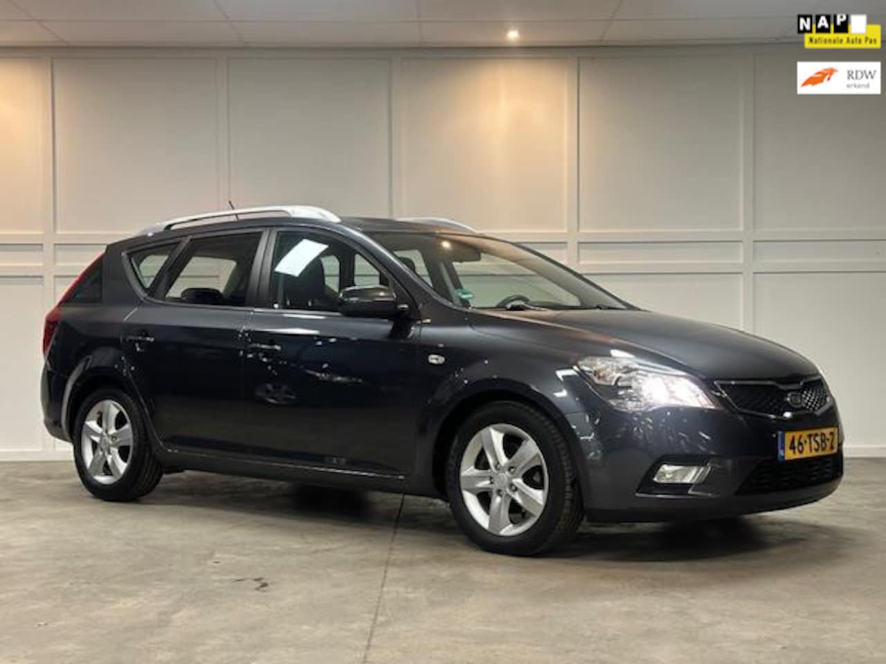 Kia Cee'd Sporty Wagon - 1.4 CVVT Navigator Plus Pack / 117.111KM / 2012 / Navi - AutoWereld.nl