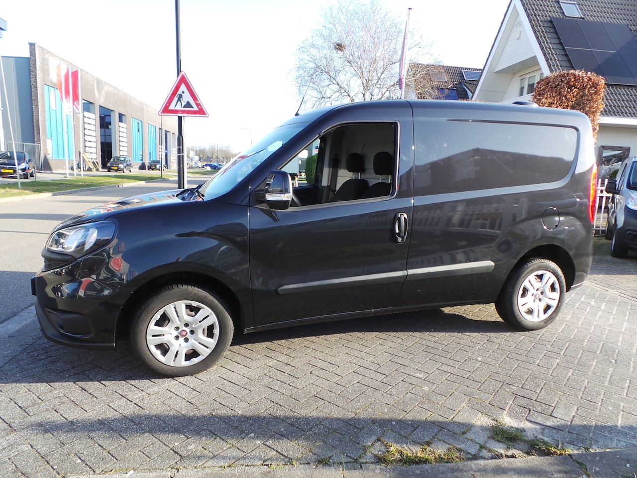 Fiat Doblò Cargo - 1.3 MJ L1H1 SX Airco,Cruise,Navigatie,Pdc,Schuifdeur - AutoWereld.nl