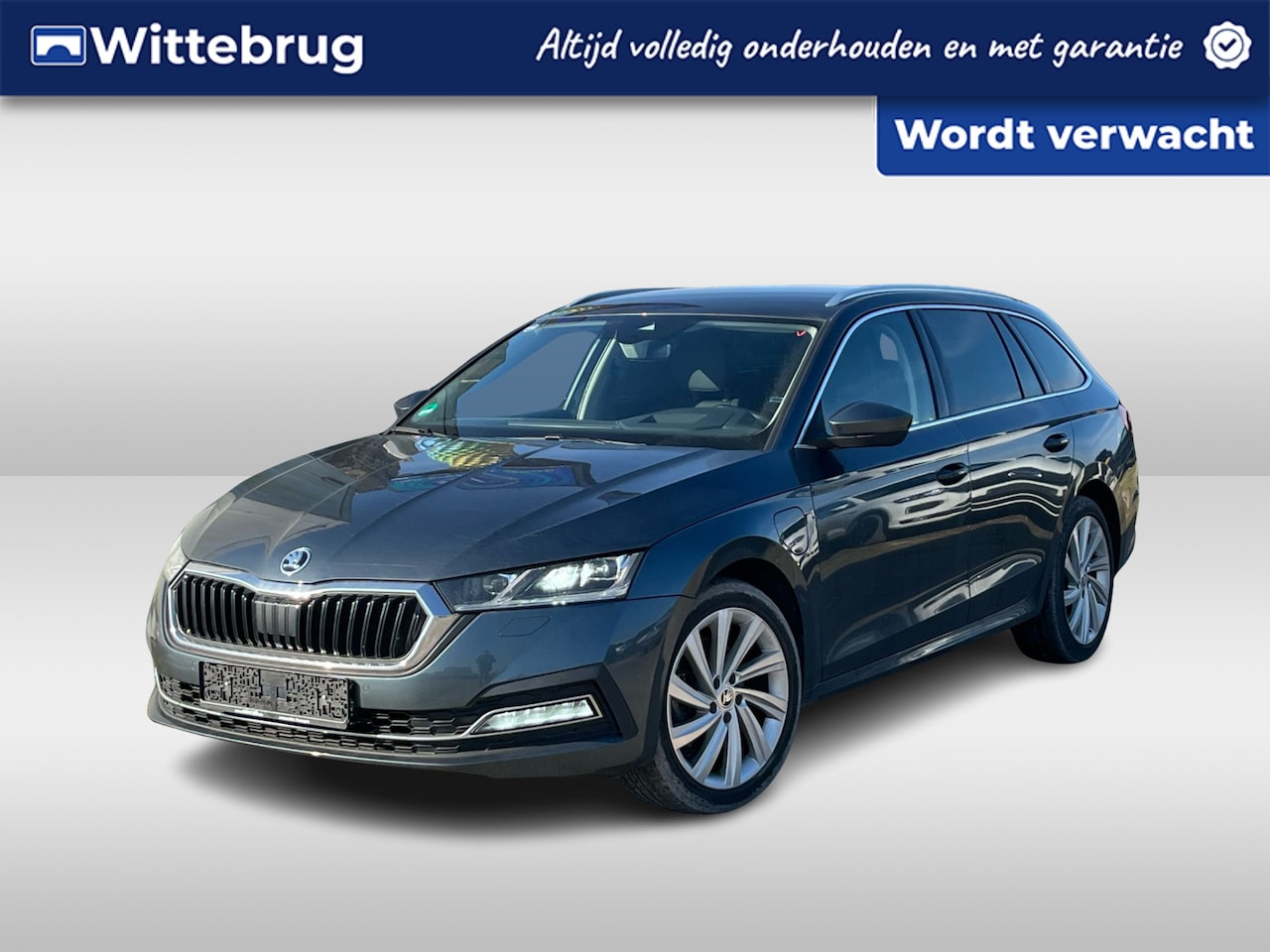 Skoda Octavia Combi - 1.4 TSI iV PHEV 204pk DSG Business Edition / Leder / 18 Inch / Zwenkbare trekhaak / Full L - AutoWereld.nl