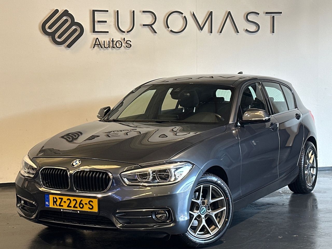 BMW 1-serie - 118i Executive Cruise - Camera - Navigatie - PDC - 5drs - Nieuw apk - AutoWereld.nl