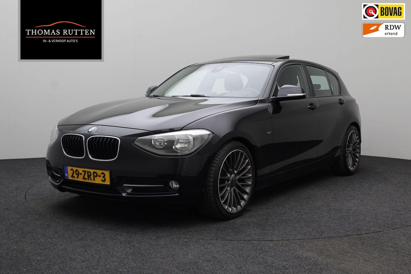 BMW 1-serie - 116i Business+ 2012 Navigatie | Clima | Camera | Bluetooth | Stoelverwarming | Sportstoele - AutoWereld.nl