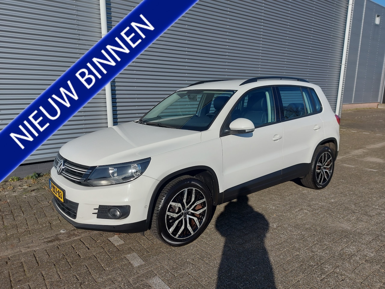 Volkswagen Tiguan - 1.4 TSI Sport&Style, airco,navigatie,stoelverwarming,leder int,parkeersensoren, - AutoWereld.nl