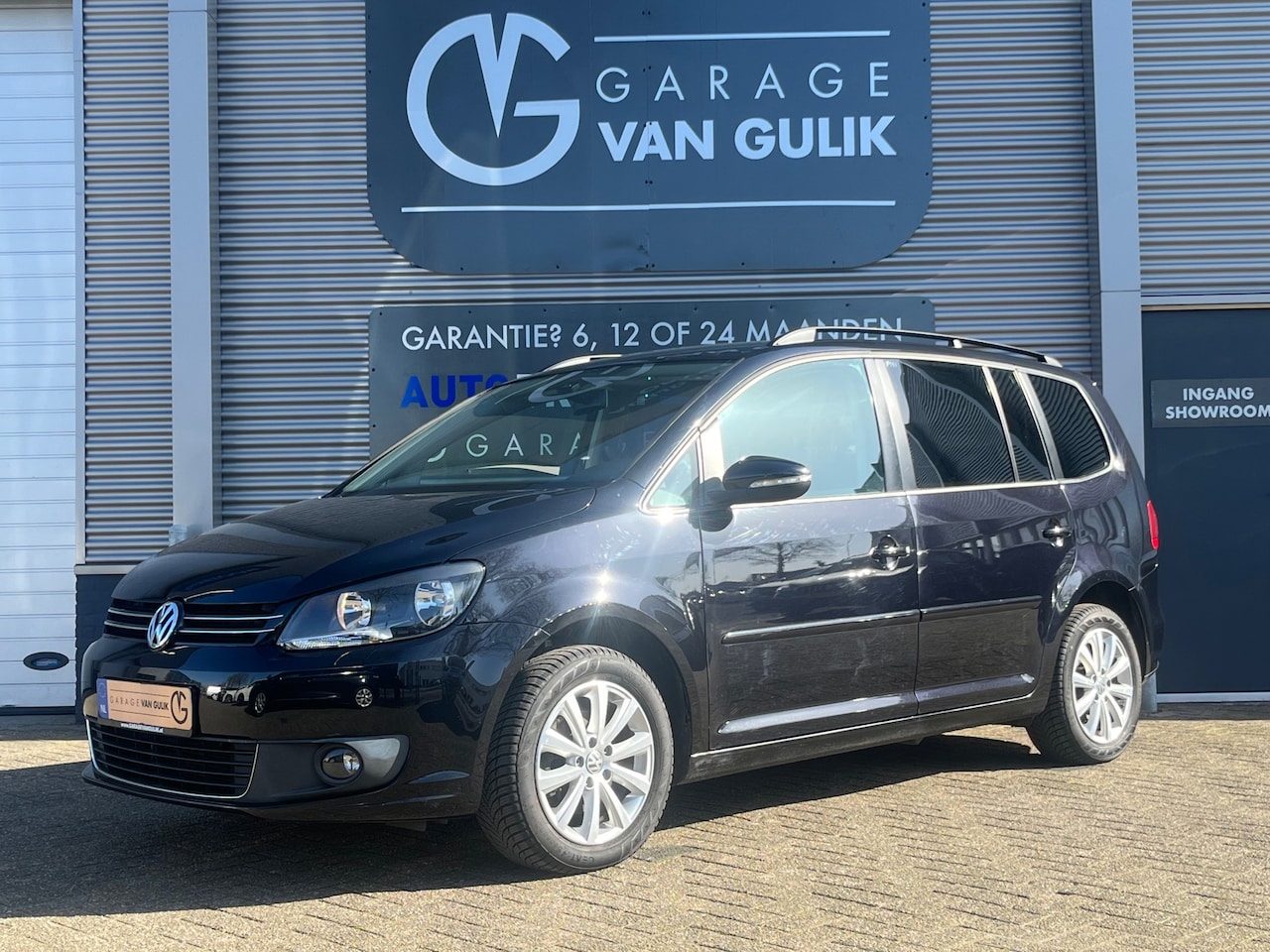 Volkswagen Touran - 1.4 140PK 7Persoons,Clima,Cruise,Trekhaak,Stoelverw,Bluetooth,Isofix,Dakrail,ParkeerSensor - AutoWereld.nl