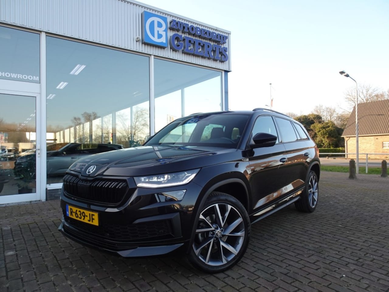 Skoda Kodiaq - 1.5 TSI Sportline Business 20inch/LED/Navi/Carplay - AutoWereld.nl