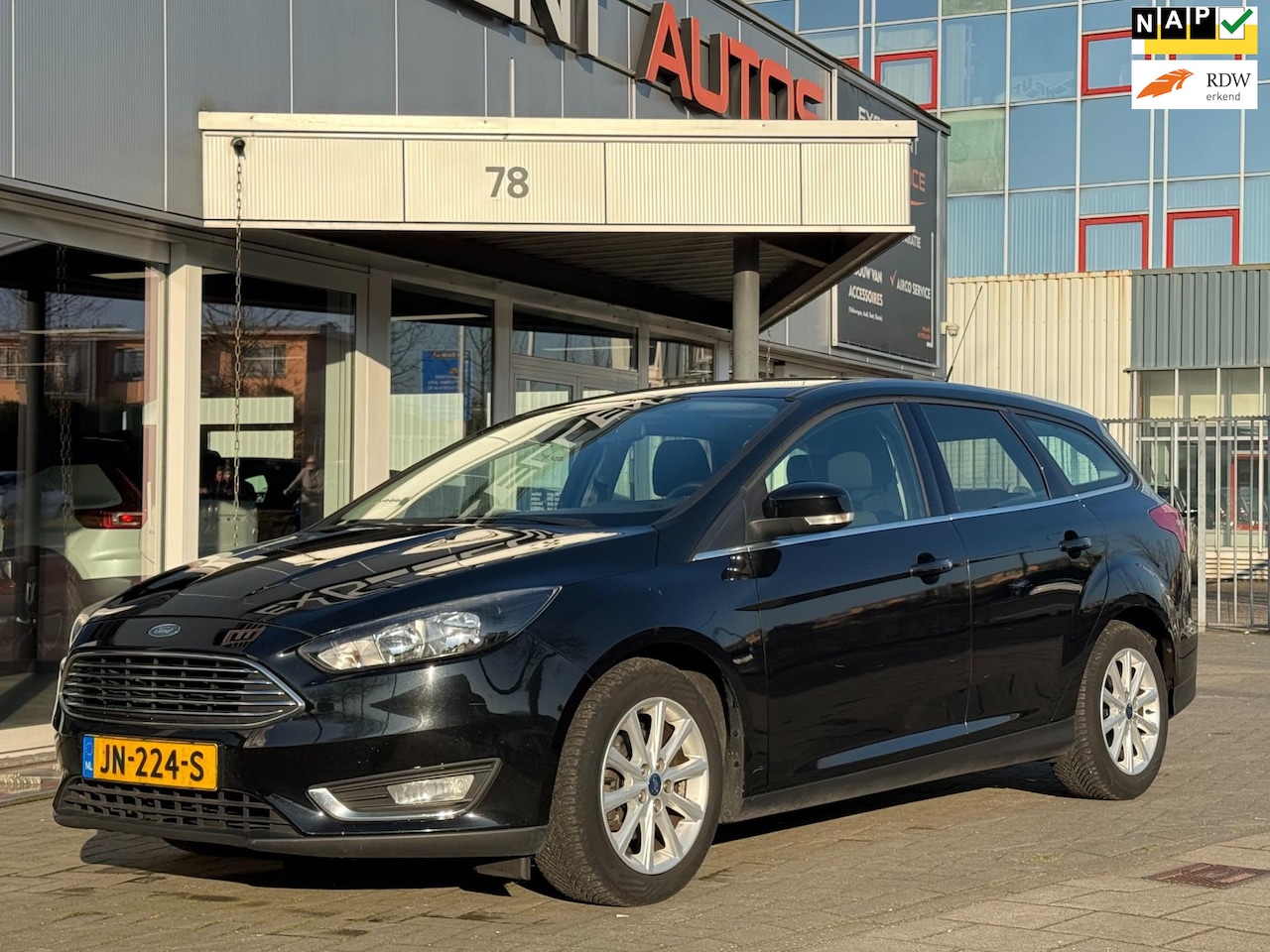 Ford Focus Wagon - 1.0 Titanium Edition | Navigatie - AutoWereld.nl