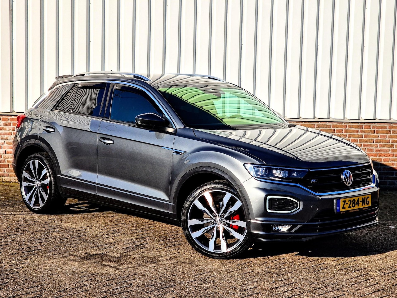 Volkswagen T-Roc - 2.0 TSI R-Line 4Motion Sport Trekhaak*Navigatie*PDC*Cruise control*Climate control*Stoelve - AutoWereld.nl