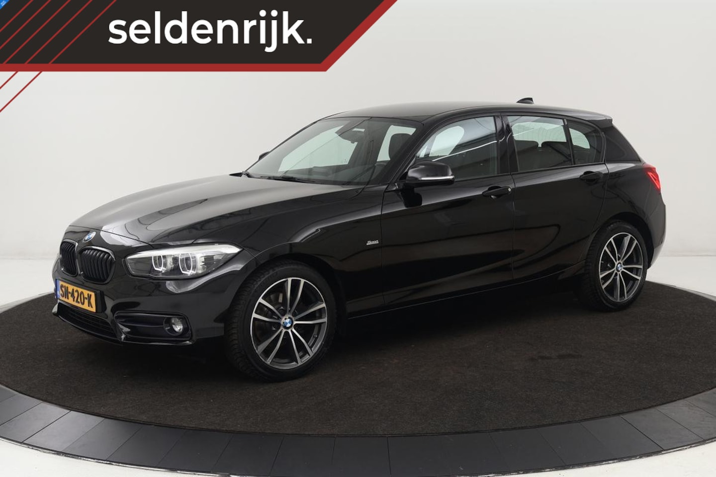 BMW 1-serie - 116i Sport | Full LED | Sportstoelen | Navigatie | Bluetooth | Climate control | PDC | Cru - AutoWereld.nl