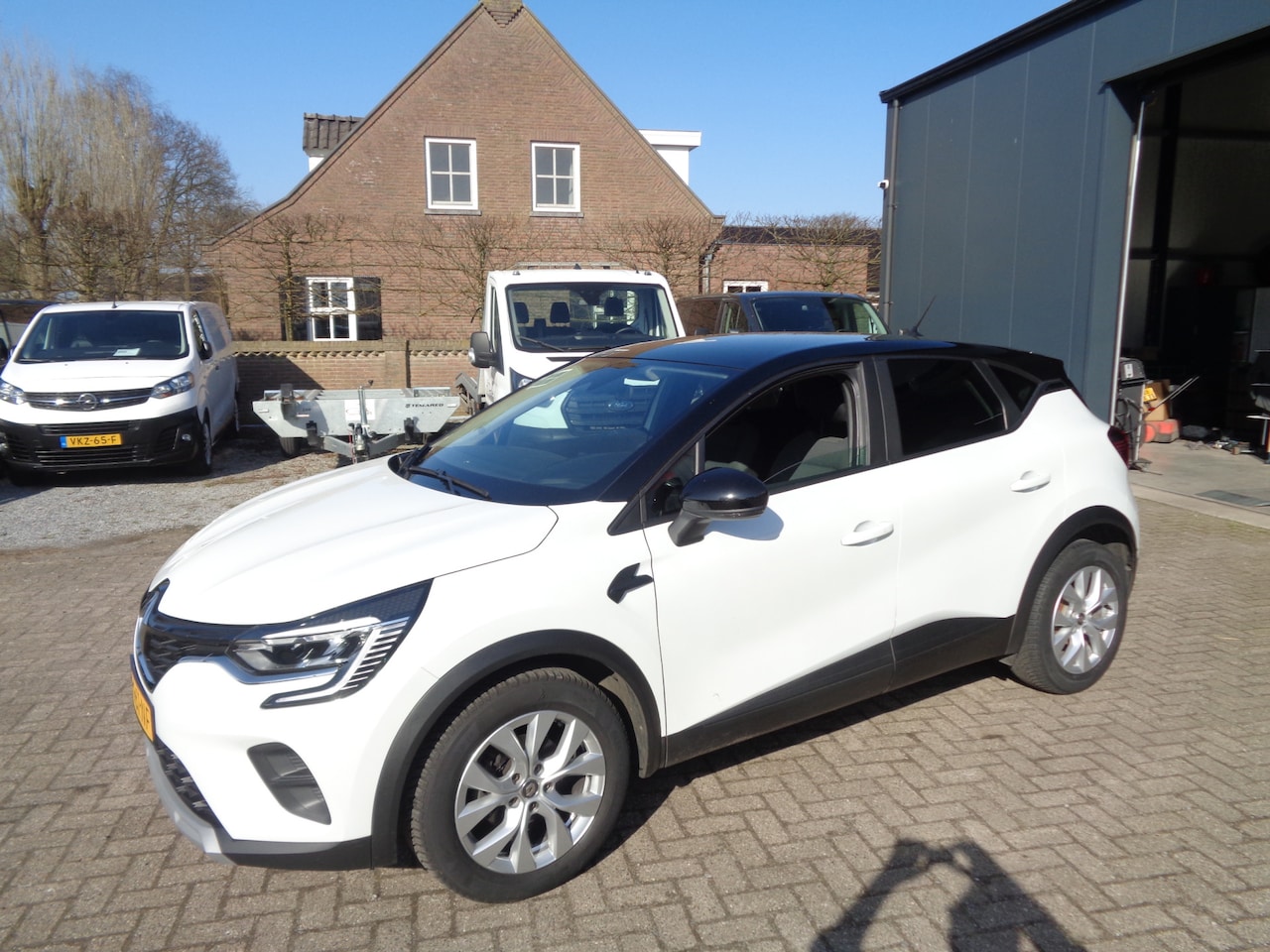 Renault Captur - 1.0 TCe 90 Zen Airco, Cruise, Carplay/android auto, LM velgen, zwart dak - AutoWereld.nl