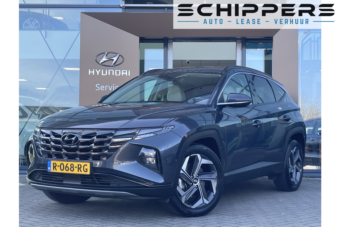 Hyundai Tucson - 1.6 T-GDI HEV Premium Stuurwiel verwarmd | Achteruitrijcamera - AutoWereld.nl