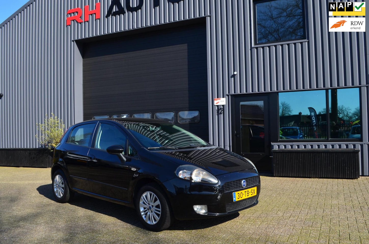 Fiat Grande Punto - 1.4 Edizione Prima | Trekhaak | Clima - AutoWereld.nl