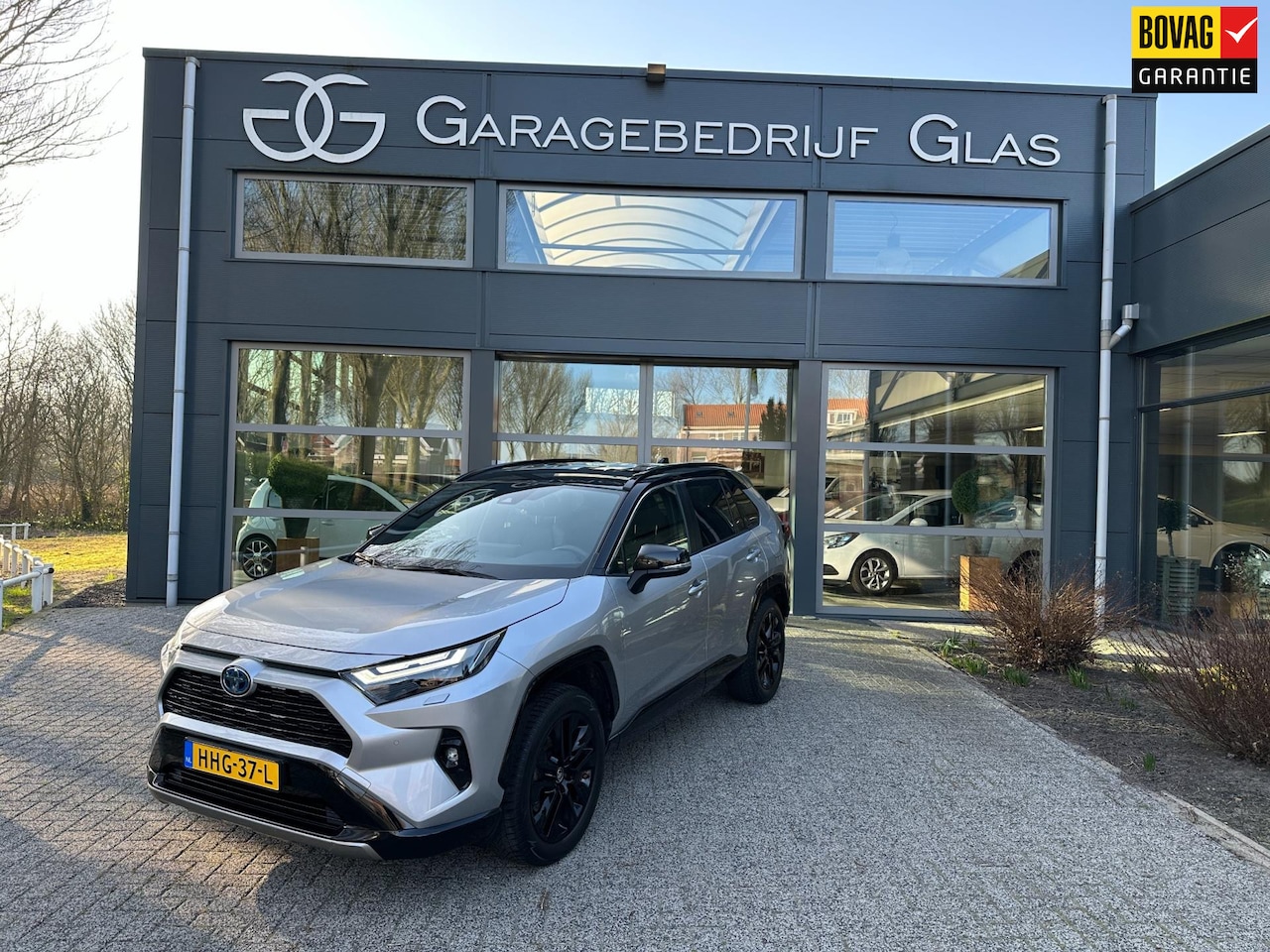 Toyota RAV4 - 2.5 Hybrid Bi-Tone camera - leer - carplay - AutoWereld.nl