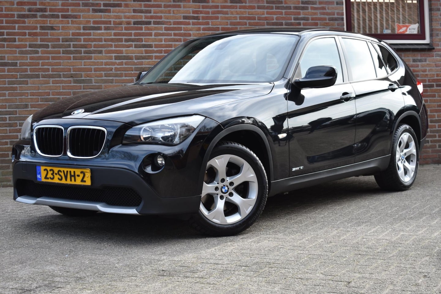 BMW X1 - SDrive18i Executive '11 Leder Navi Clima Cruise Inruil mogelijk - AutoWereld.nl