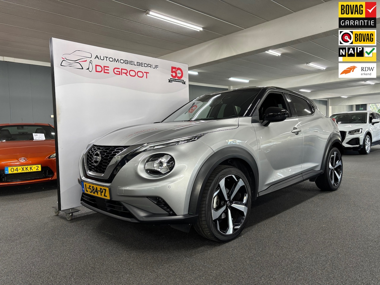 Nissan Juke - 1.0 DIG-T N-Design / Automaat, Navi, Camera, Apple Carplay - AutoWereld.nl