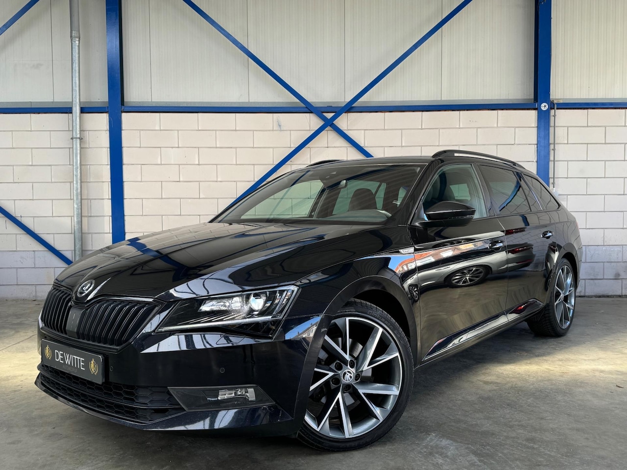 Skoda Superb Combi - 2.0 TSI Sportline Trekhaak|Camera|SPORTZETELS - AutoWereld.nl