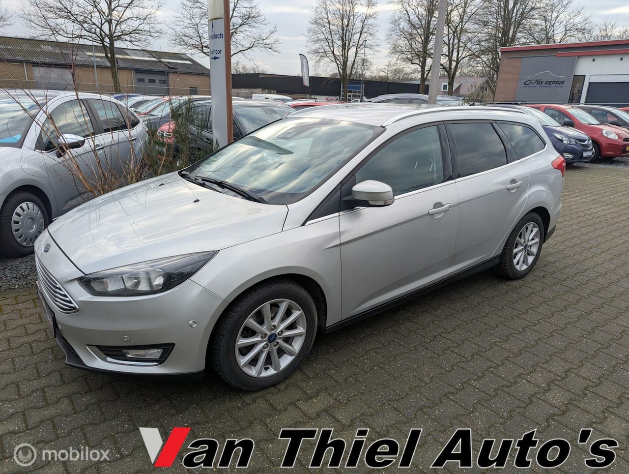 Ford Focus Wagon - 1.5 zilver Edition navi cruis - AutoWereld.nl