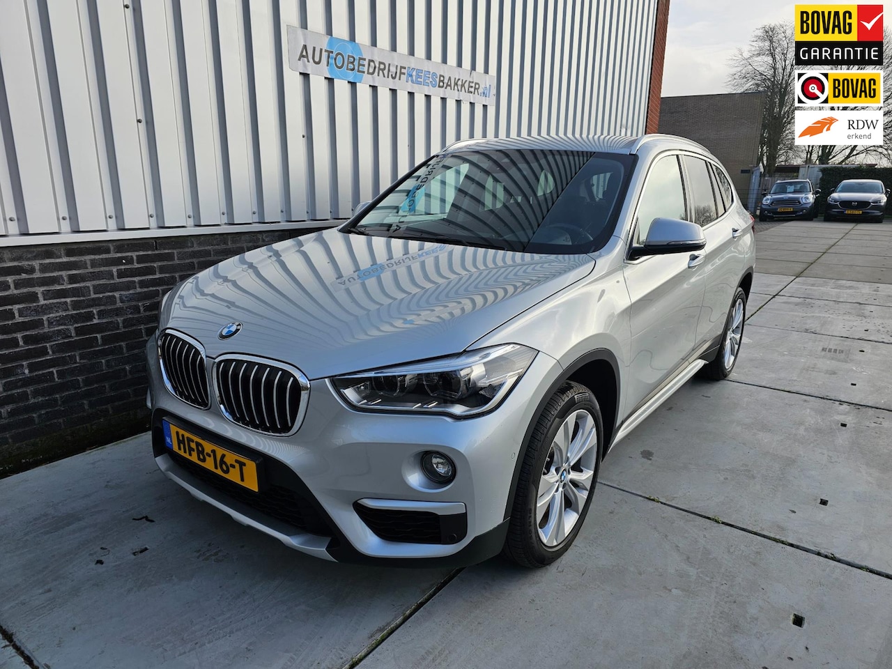 BMW X1 - SDrive20i High Executive / Trekhaak / stoelverwarming / cruisecontr. - AutoWereld.nl