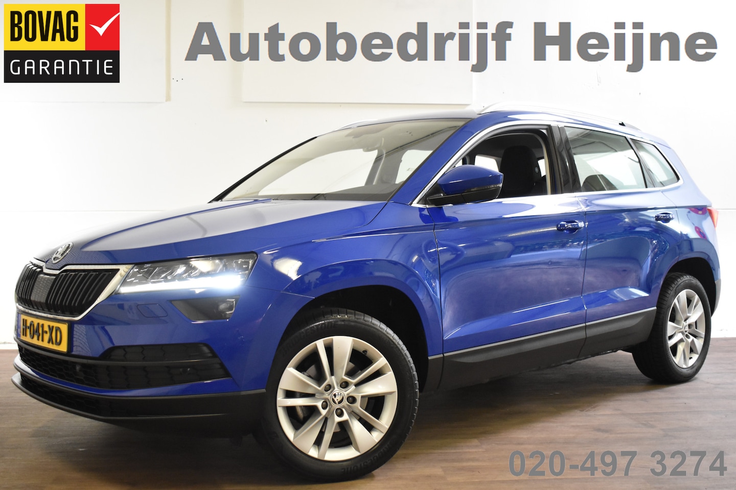 Skoda Karoq - 1.5 TSI 150PK ACT DSG BUSINESS EDITION CAMERA/NAVI/TREKHAAK - AutoWereld.nl