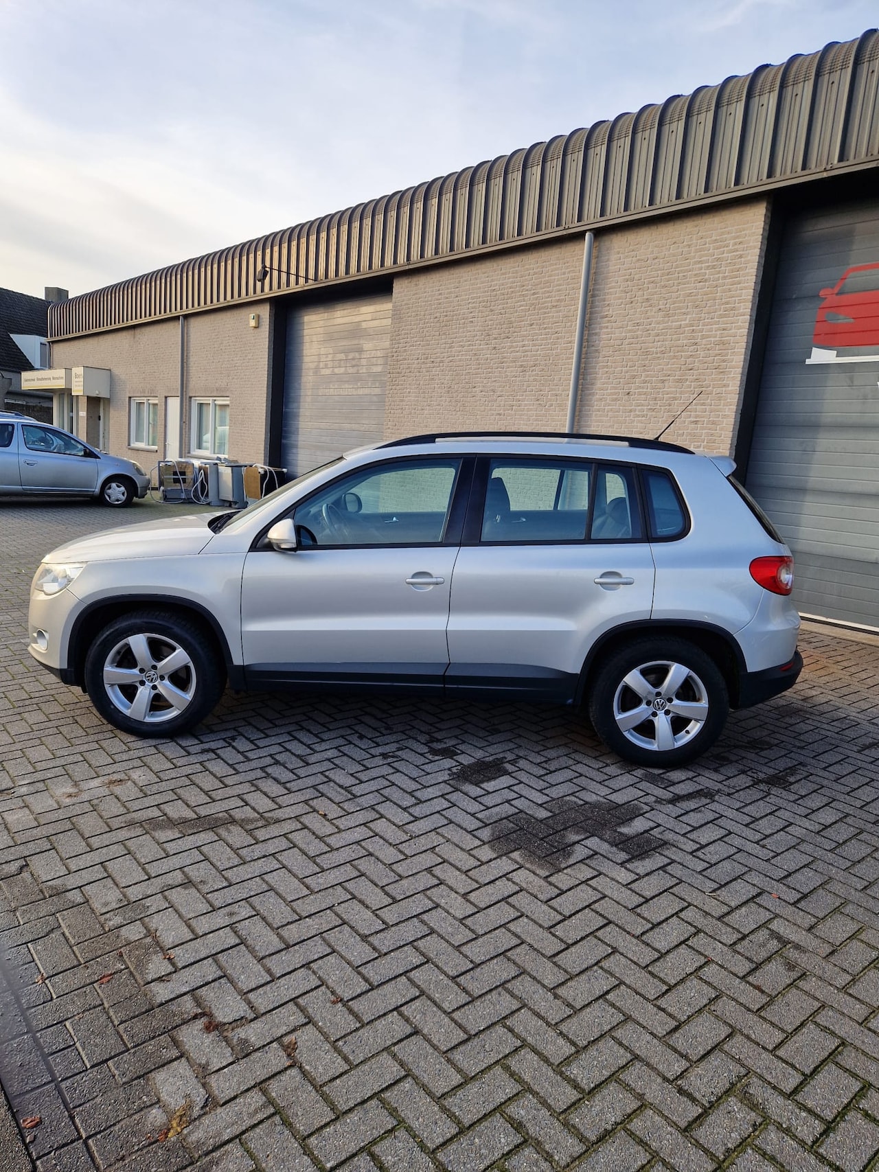 Volkswagen Tiguan - 1.4 TSI Comfort&Design turbo + compressor - AutoWereld.nl