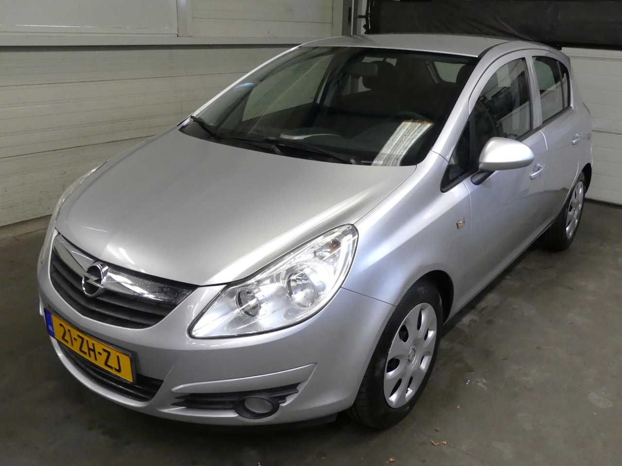 Opel Corsa - 1.2-16V Enjoy - Airco - 5 deurs - Cruise Control - AutoWereld.nl