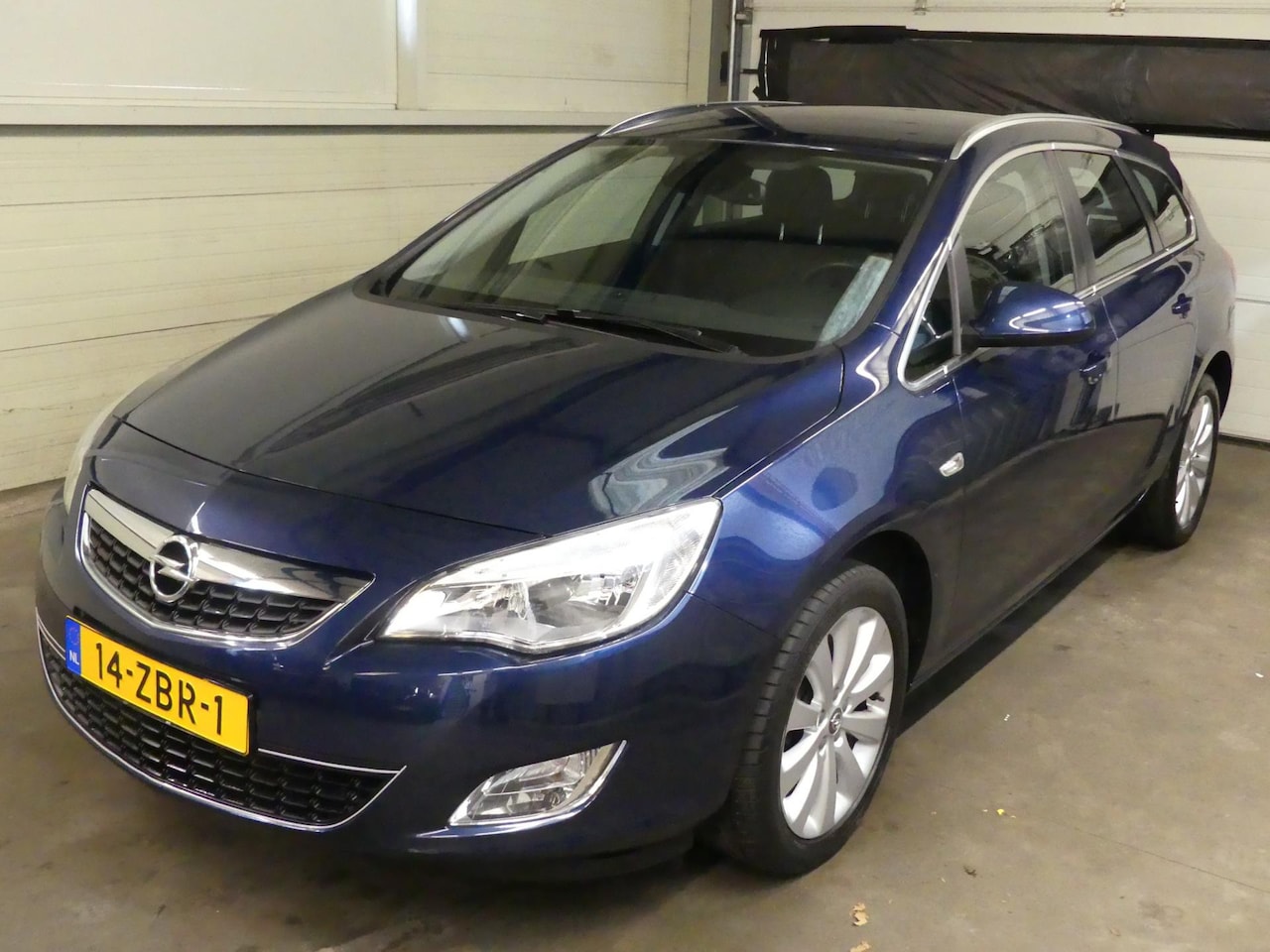 Opel Astra Sports Tourer - 1.4 Cosmo - Navigatie - Cruise Control - Trekhaak - AutoWereld.nl