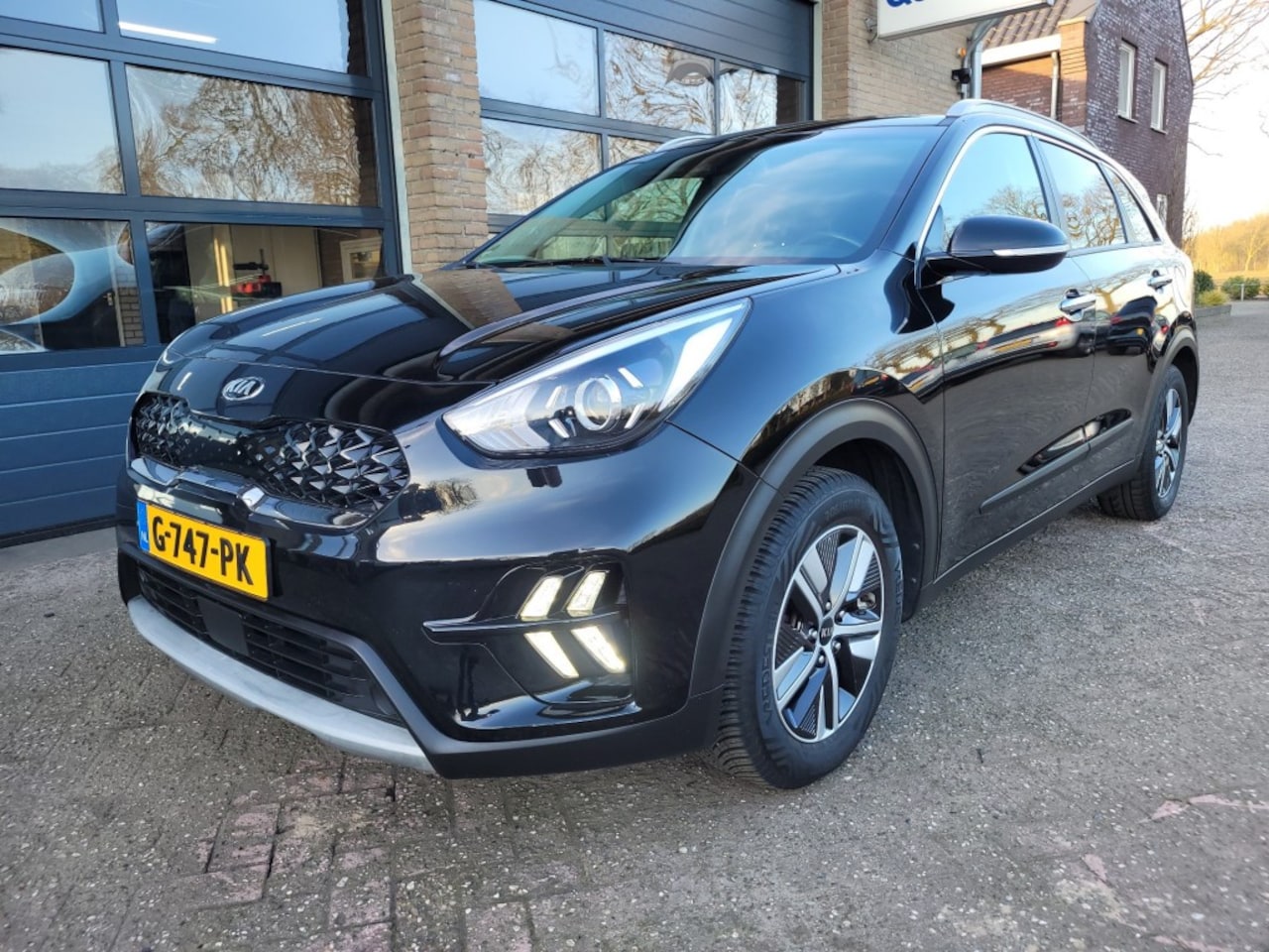 Kia Niro - 1.6 GDI hybrid  Executive Line automaat, camera, half leer, app - AutoWereld.nl