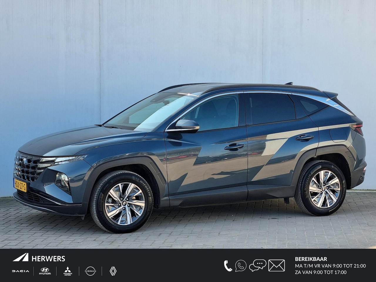 Hyundai Tucson - 1.6 T-GDI HEV Comfort Automaat / 1650KG Trekgewicht / Navigatie / Camera / Stoelverwarming - AutoWereld.nl