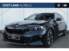 BMW i5 Touring - eDrive40 High Executive M Sport / Panoramadak / Trekhaak / Parking Assistant Professional