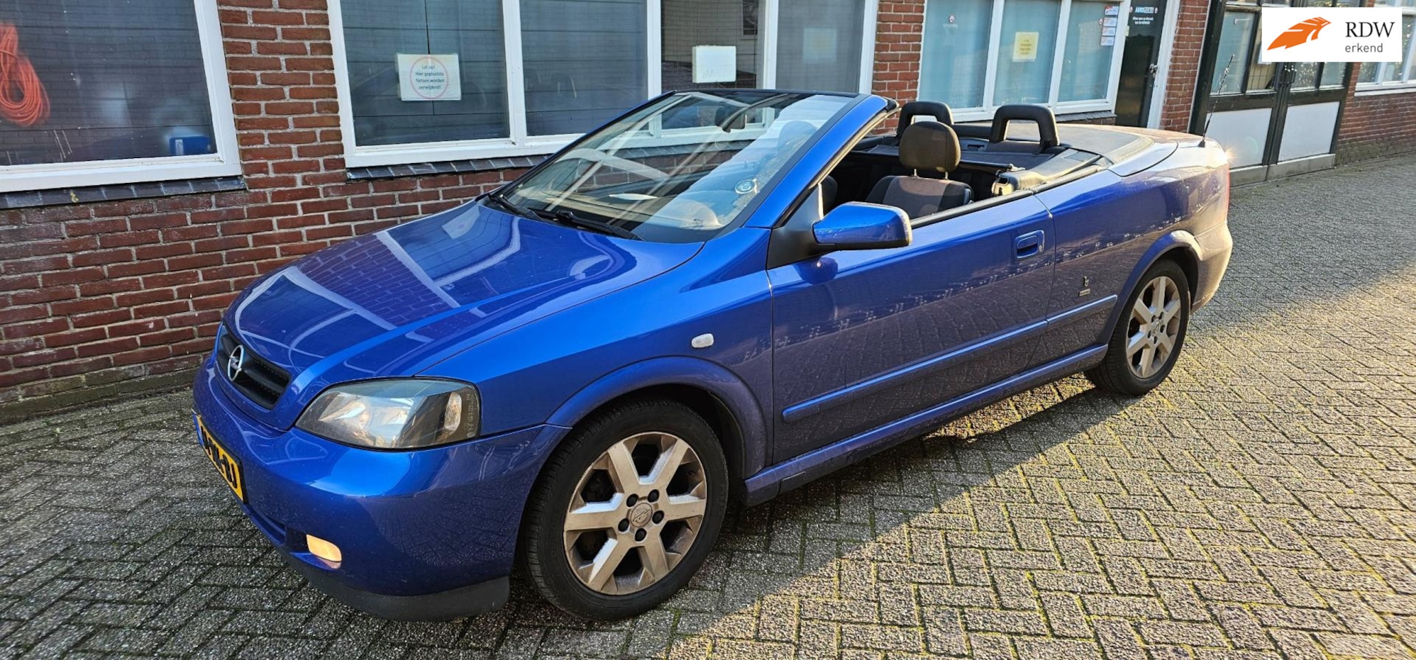 Opel Astra Cabriolet - 1.8-16V elektrische kap lage kms nl auto - AutoWereld.nl