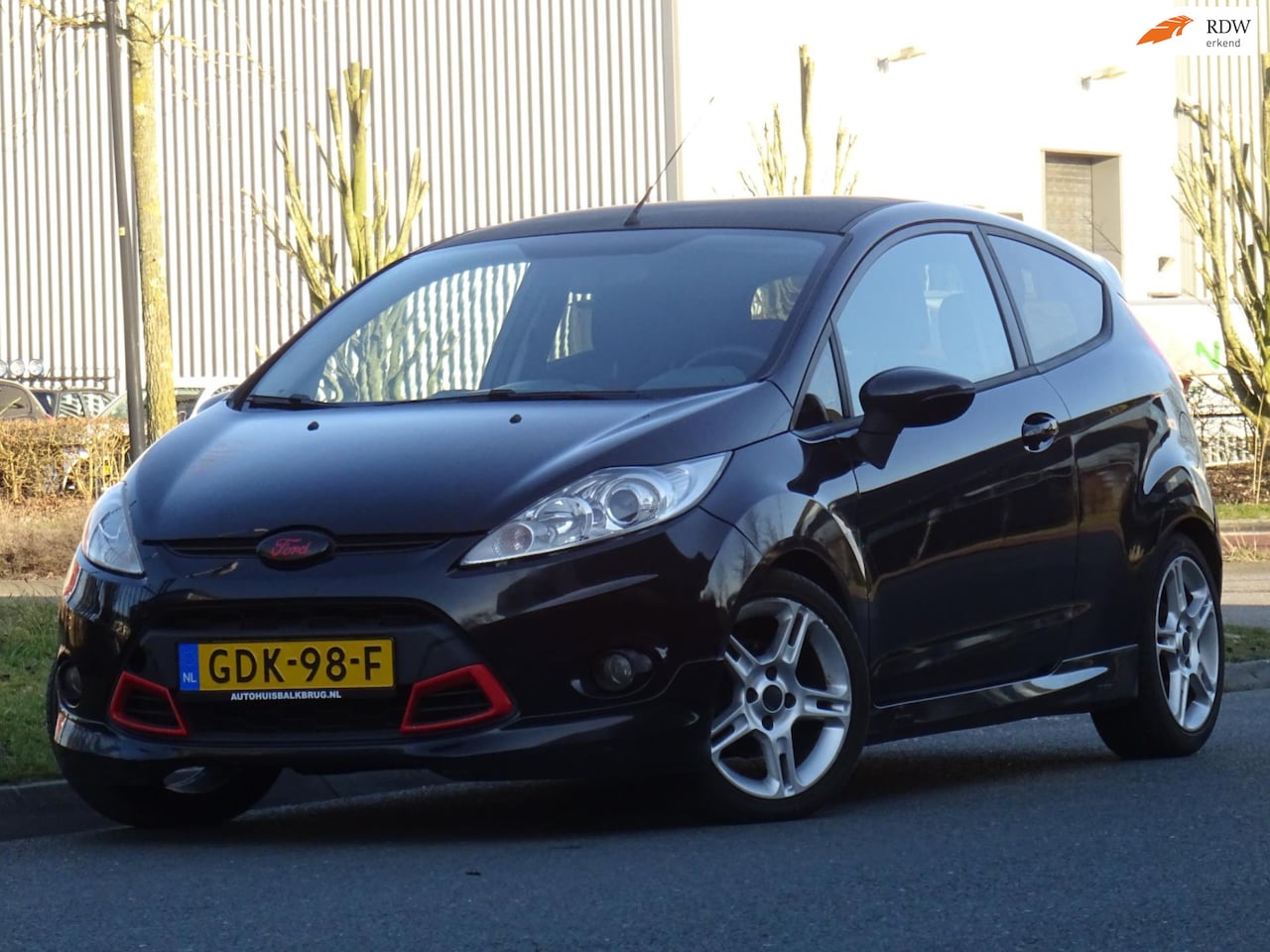 Ford Fiesta - 1.4 ST-SPORT CARBON AIRCO/PDC/APK 02-2026 - AutoWereld.nl