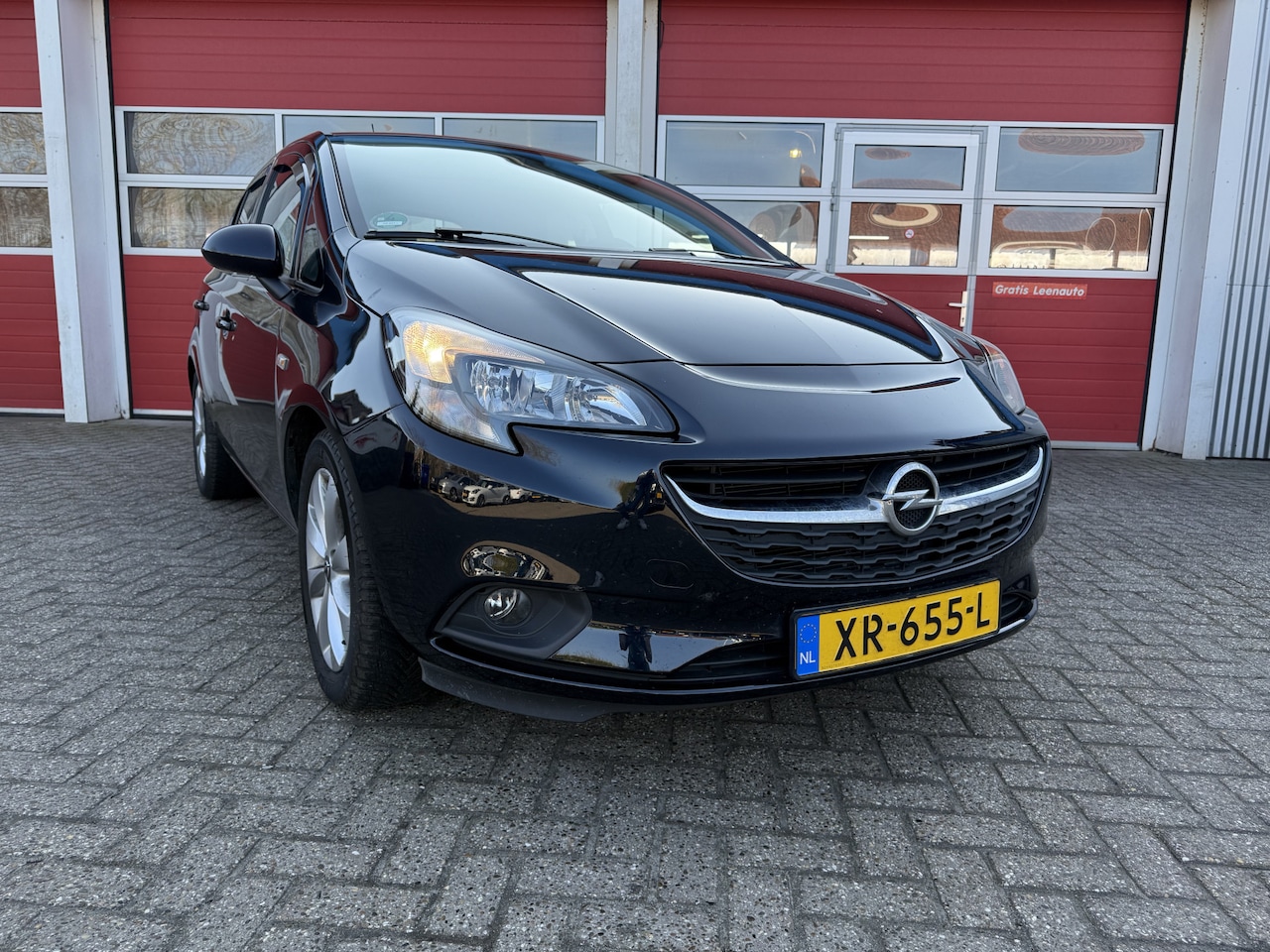 Opel Corsa - 1.4 90 PK | Favourite | Navi | 46.000 km! | Trekhaak | Airco | - AutoWereld.nl