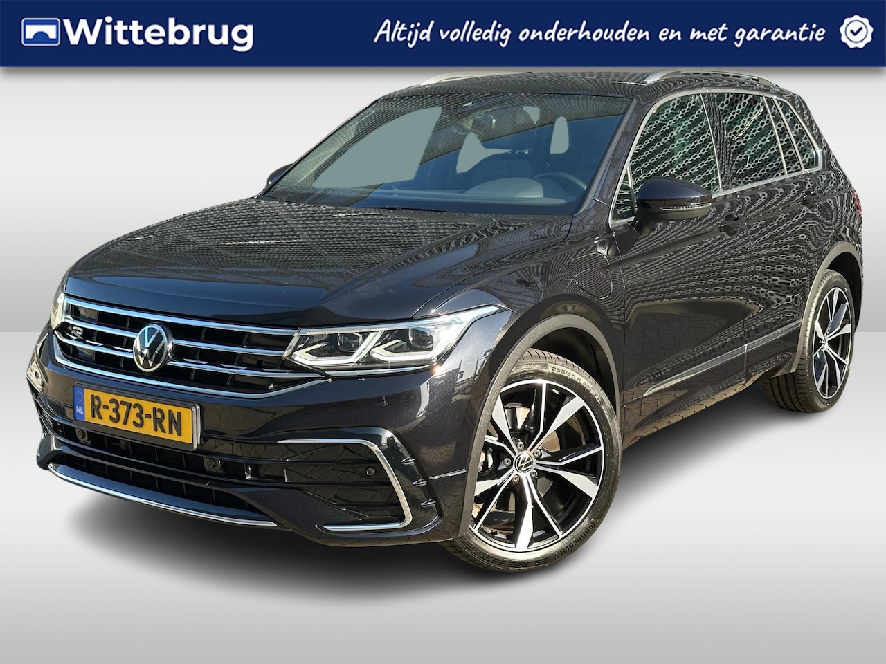 Volkswagen Tiguan - 1.4 TSI eHybrid R-Line Business+ / Pano / Navigatie / Zwenkbare trekhaak / 3x R-line / P4 - AutoWereld.nl