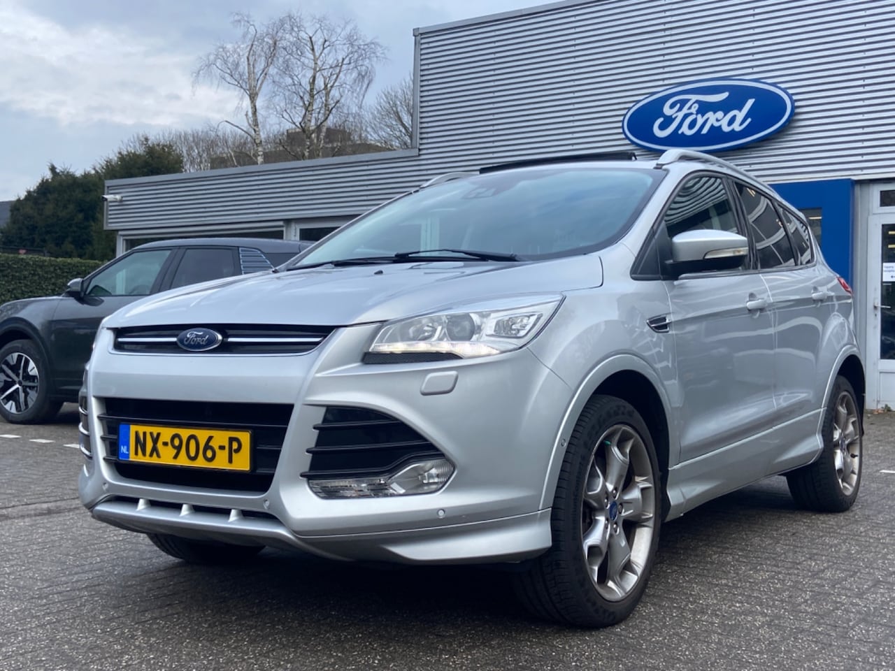 Ford Kuga - 2.0 TDCI TITANIUM STYLING PACK 4WD AUTOMAAT | LEDER | PANODAK | ADAPTIVE CRUISE | DEALER O - AutoWereld.nl