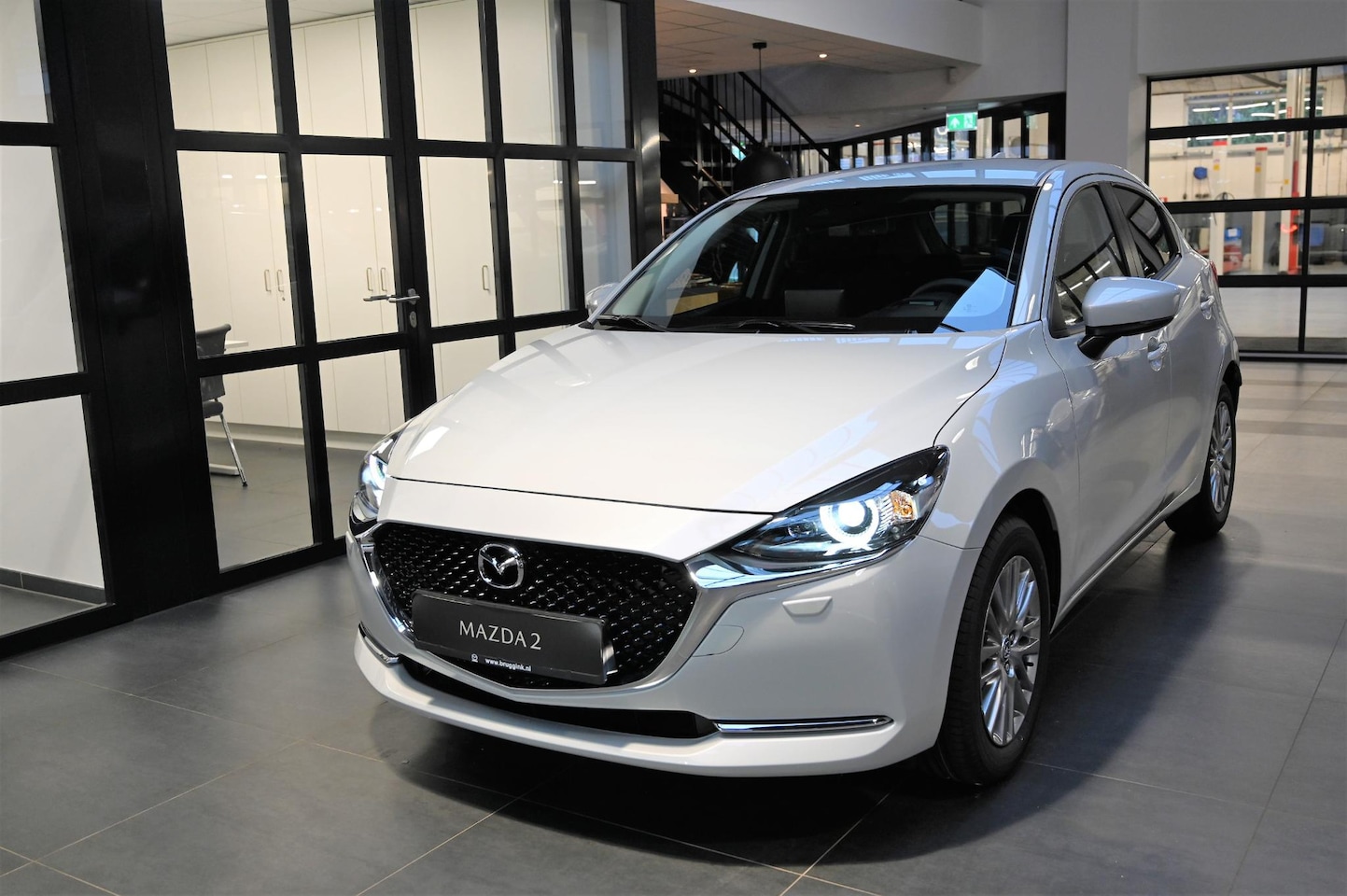 Mazda 2 - Skyactiv-G 90 6MT Luxury met I-activsense *Trekhaak* *Dealeronderhouden* *All-in prijs* - AutoWereld.nl