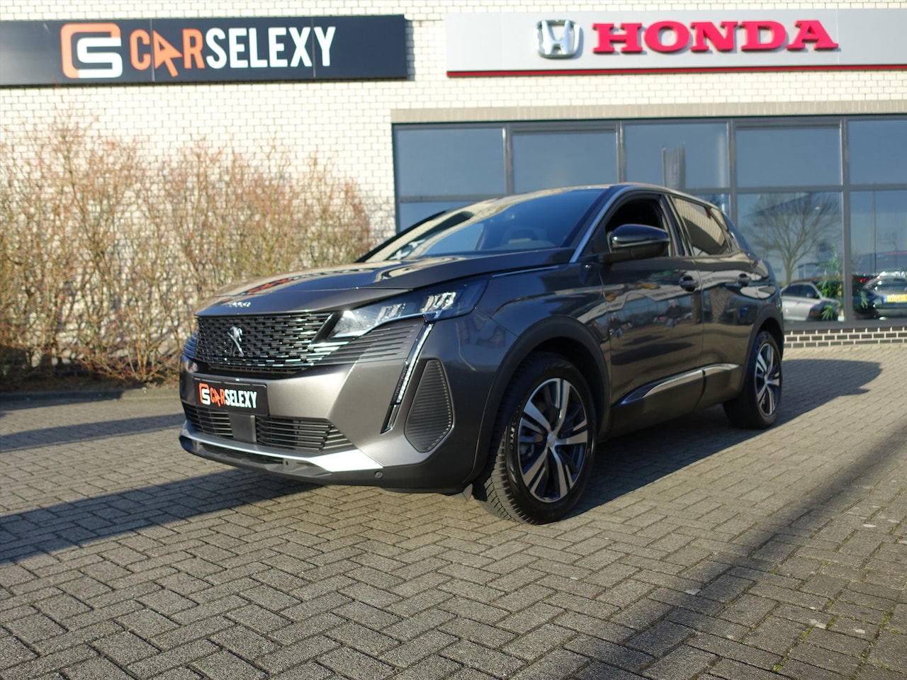 Peugeot 3008 - 1.2 Hybrid 136pk e-DSC6 Allure Pack Business - AutoWereld.nl