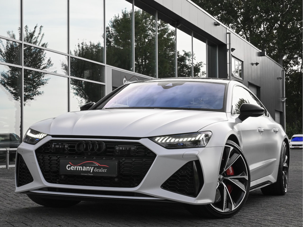 Audi RS7 - Sportback 4.0TFSI 600pk Quattro Black optic Matt-Individual | Keramiek | B&O | Pano | 4W-b - AutoWereld.nl