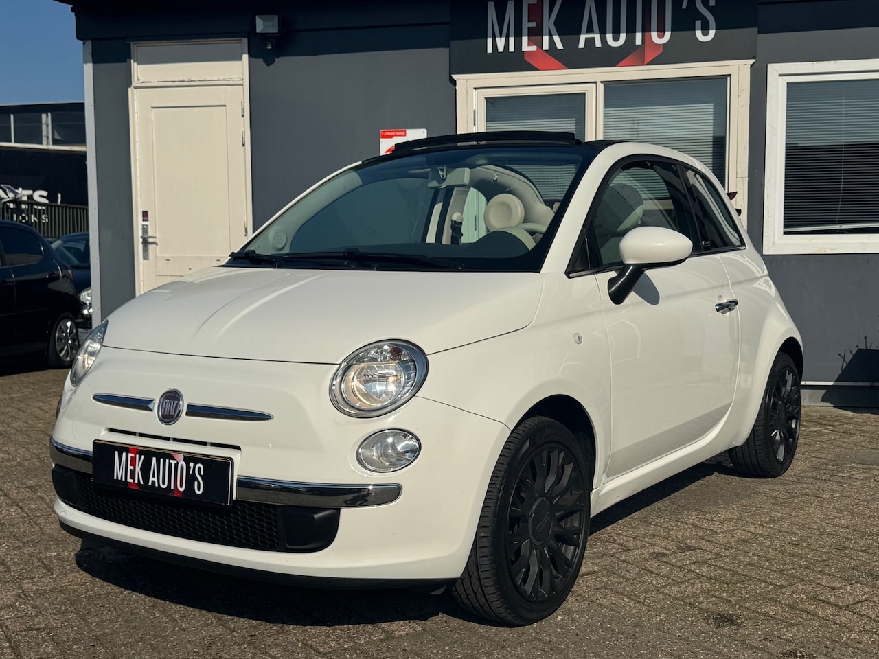 Fiat 500 C - 1.2 Lounge|Airco|Half|Leder|Velgen|Dealer|Cabrio| - AutoWereld.nl