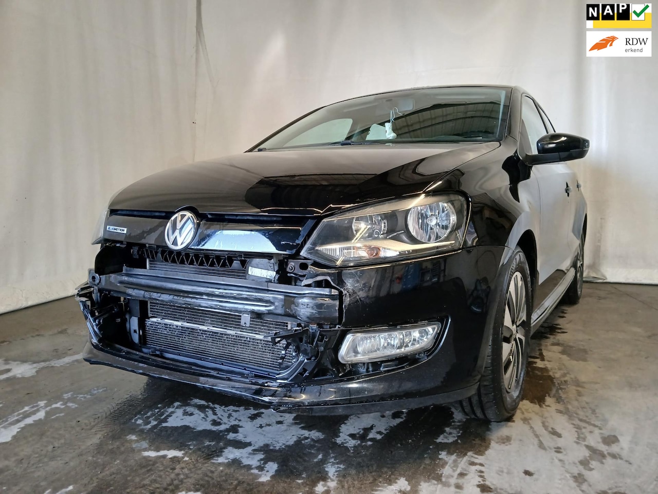 Volkswagen Polo - 1.4 TDI BlueMotion - Airco - Navi - Cruise - Schade - AutoWereld.nl