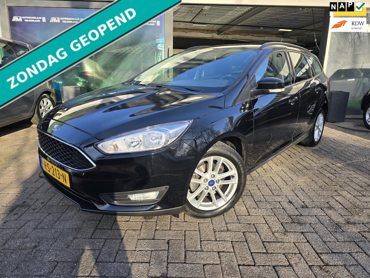 Ford Focus Wagon - 1.0 Lease Edition | 12 MND GARANTIE | NW APK |AIRCO | NAVI | PDC | LMV | - AutoWereld.nl