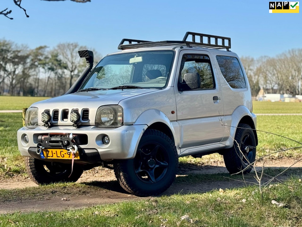 Suzuki Jimny - 1.3 JX 4WD 1.3 JX 4WD - AutoWereld.nl