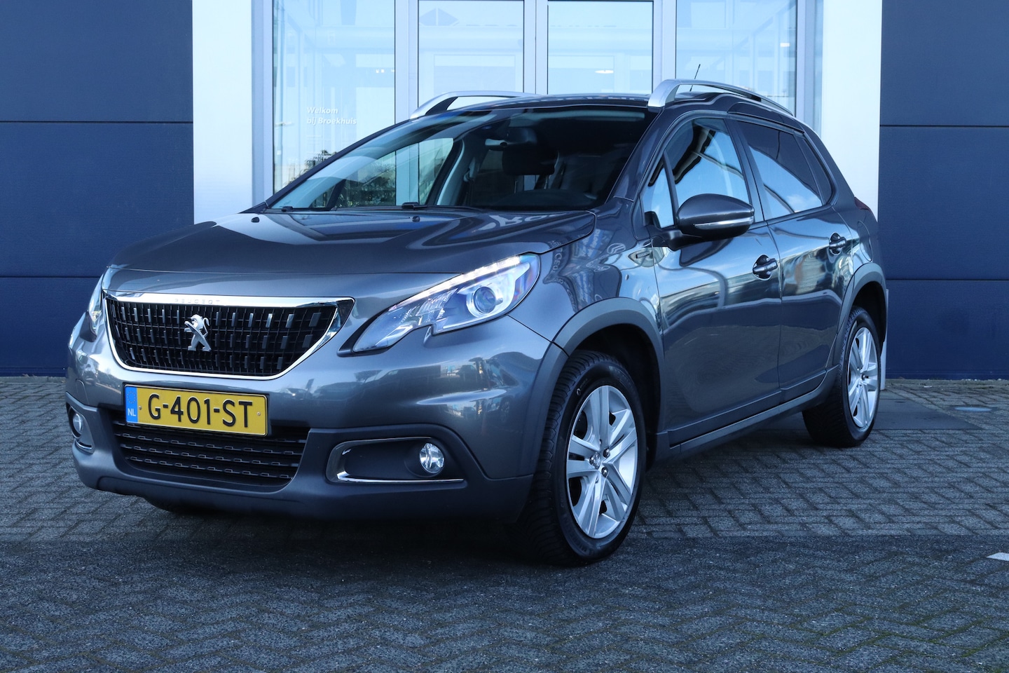 Peugeot 2008 - 1.2 Turbo Signature | Cruise Control | Sensoren | Navi | Carplay | Airco - AutoWereld.nl