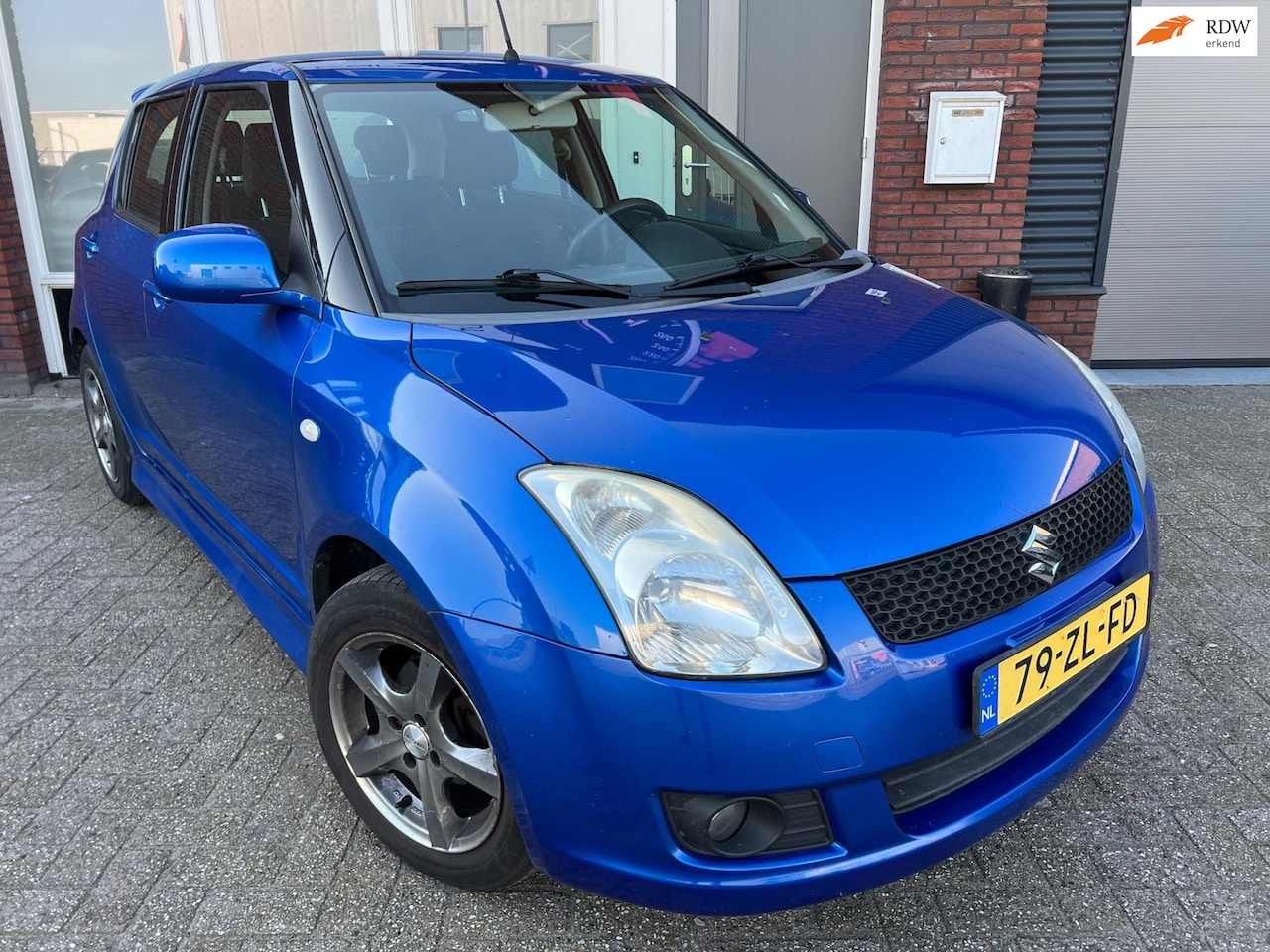 Suzuki Swift - 1.5 Exclusive / 5DRS / Keyless / NAP - AutoWereld.nl