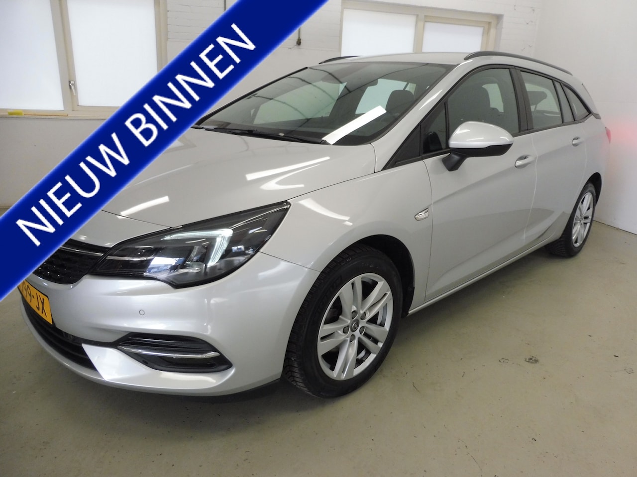 Opel Astra Sports Tourer - 1.2 Edition Navi | Cruise | LED | LMV 16"| Apple carplay | NL auto  | Géén afleverkosten - AutoWereld.nl