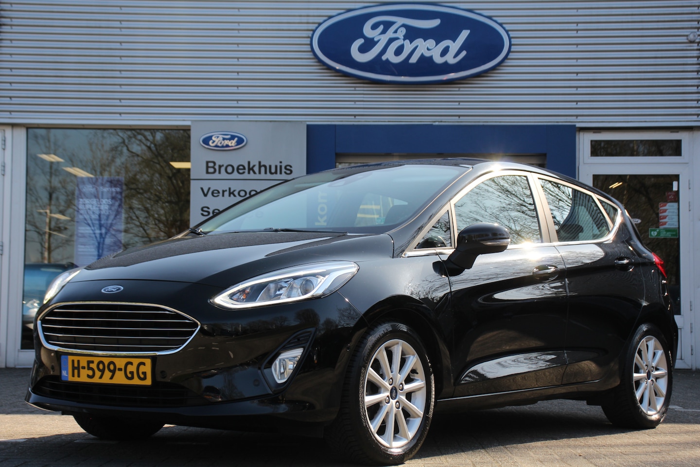 Ford Fiesta - 1.0EB TITANIUM | NAVI | CAMERA | CLIMA | STOELVERWARMING | CRUISE | AUTO. INPARKEREN | PAR - AutoWereld.nl